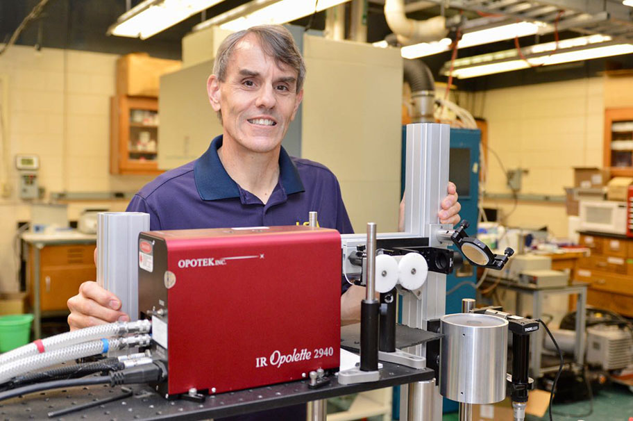 Prof. Kermit Murray of Louisiana State University with an infrared optical parametric oscillator.